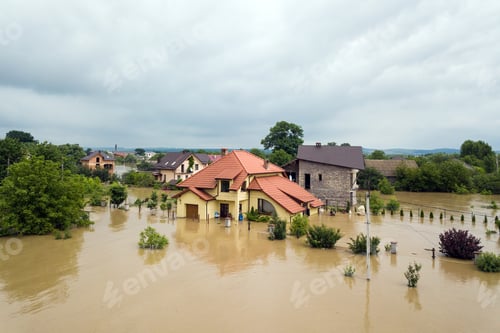 Preview: Aerial view of flooded houses with dirty water of Dnister river in Halych town, western Ukraine.