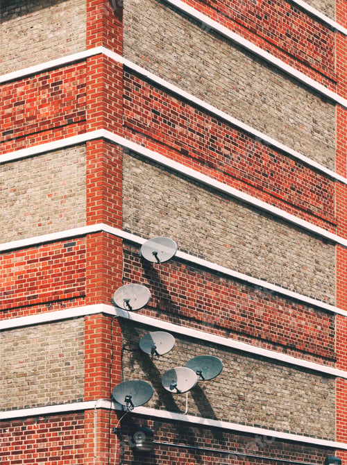 Preview: Detail of satellite dishes attached to building
