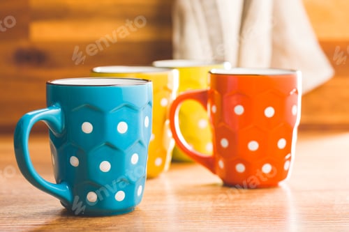 Preview: The polka dot mugs on kitchen table.