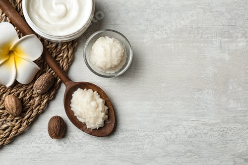 Preview: Flat lay composition with Shea butter, nuts and space for text on light background