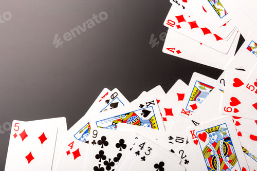 Preview: poker chips and cards on black background