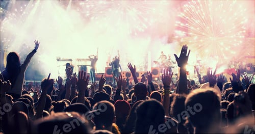 Preview: New Year concept - cheering crowd and fireworks