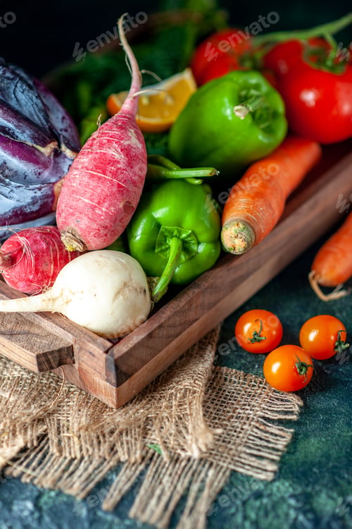 Preview: front view fresh vegetables radish tomatoes carrots and cabbage on dark background health color
