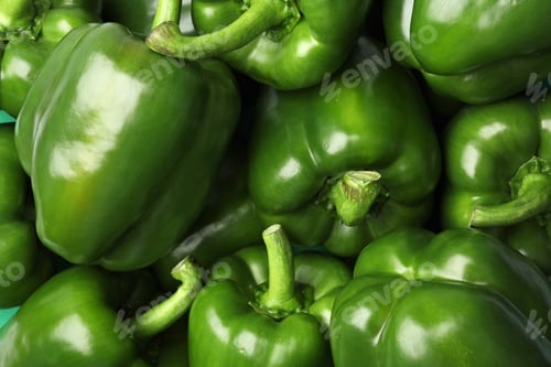 Preview: Ripe green bell peppers as background, top view