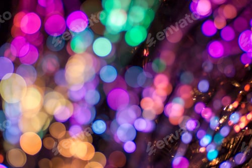 Preview: Colored defocused lights background. Abstract bokeh lights .
