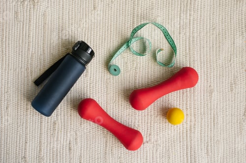 Preview: Flat lay of Red Dumbbell, Centimeter, Sports Equipment, Fitness Items, Water Bottle, top view