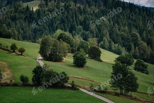 Preview: Road in mountain valley at sunny morning in Poland.