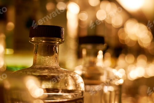 Preview: Bottle of Alcoholic Beverages Placed in Row at Bar Counter at Restaurant