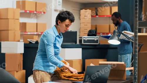 Preview: Happy woman using products from storehouse to prepare order