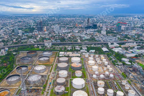 Preview: Petrochemical oil refinery in Bangkok City, Thailand. Oil and gas tanks in industry factory.
