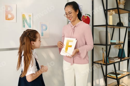 Preview: Girl Naming Letters on Cards