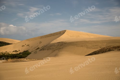 Preview: Sand dunes under a twilight sky with stars starting to appear