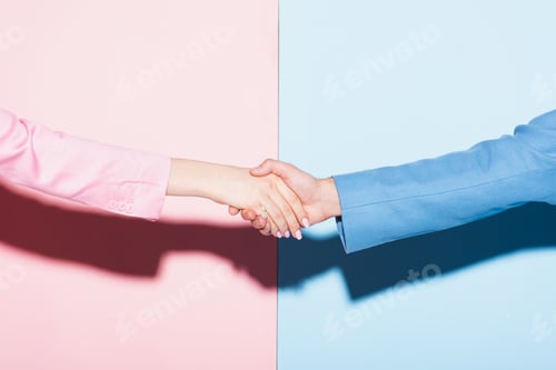 Preview: cropped view of woman and man shaking hands on pink and blue background