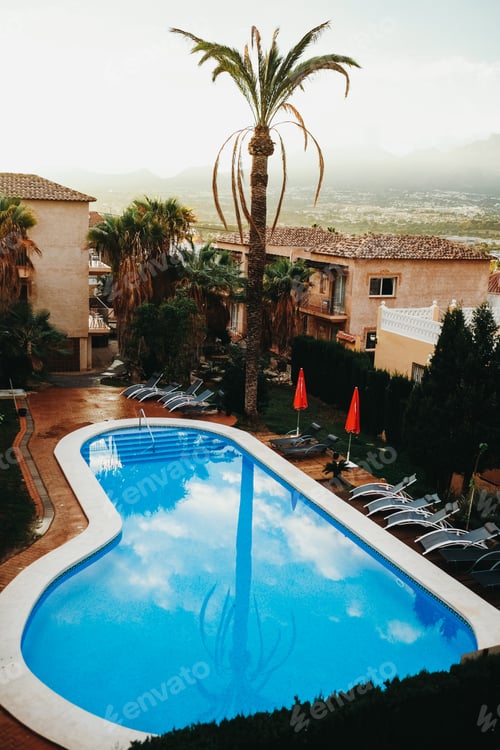 Preview: Picturesque poolside of tropical hotel