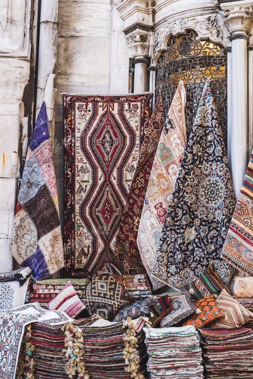 Preview: Handmade carpets sold and hunging on the wall at Asian street market, Tyrkey, Istanbul