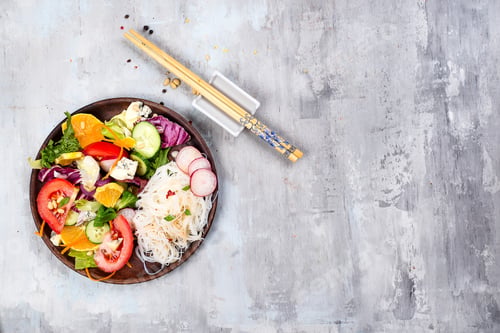 Preview: Fresh Salad Bowl with Chopsticks and Ingredients