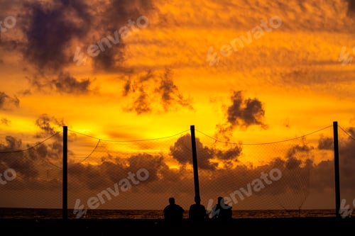 Preview: Silhouette of people by the beach