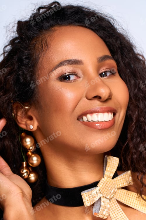 Preview: Radiant beauty with a charming smile and elegant accessories in a vibrant setting