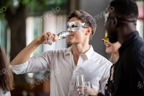 Preview: Group of people enjoy drinking at the company party