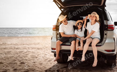 Preview: Family with Car travel driving road trip summer vacation in car in the sunset,