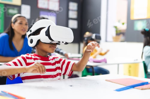 Preview: In school, in the classroom, a diverse group is exploring virtual reality, copy space