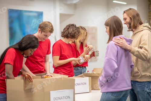 Preview: Volunteers working in a donations distribution center