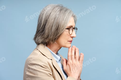Preview: Senior sad businesswoman in eyeglasses looking away and thinking problems isolated
