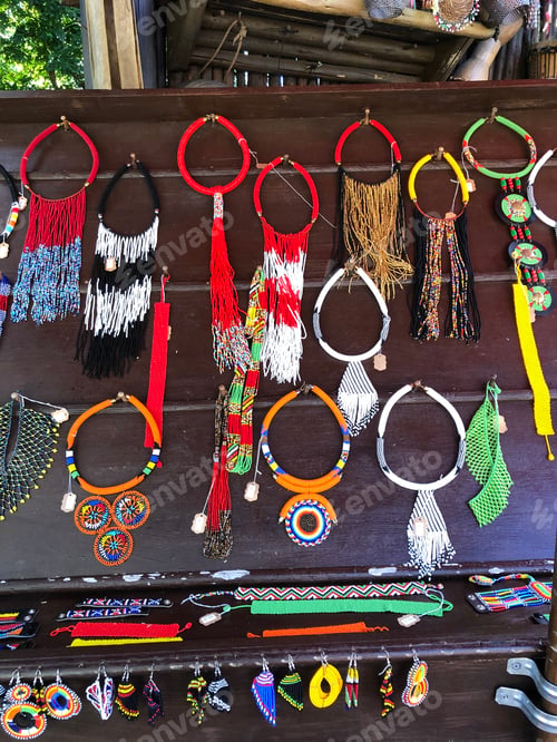 Preview: Artisan jewelry on display for people to buy.