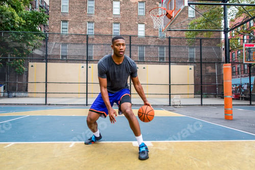 Preview: Basketball player training outdoors