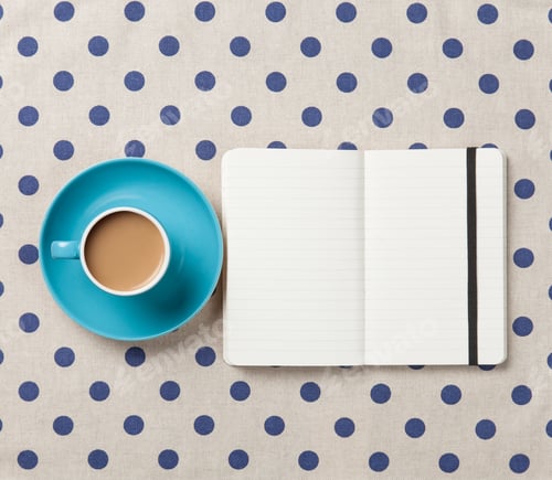 Preview: Cup of coffee and notebook