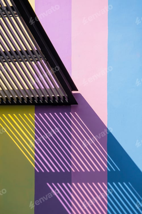 Preview: Sunlight and shadow of transparent awning on surface of pastel building wall in vertical frame