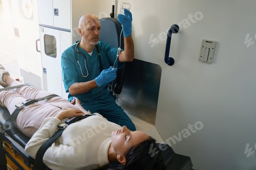 Preview: Medical staff is checking the IV system before the procedure