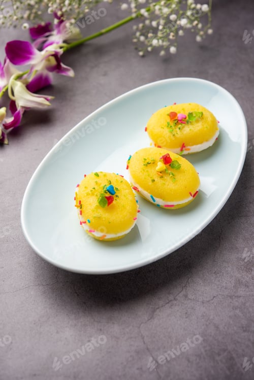 Preview: Malai Chop or Cream sandwich made using filling Rasgulla or Gulab jamun sweet is a Bengali sweet