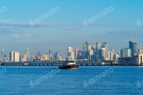 Preview: Cargo tanker ships in transportation concept. Shipping boats at Singapore harbor. Clear blue sea.