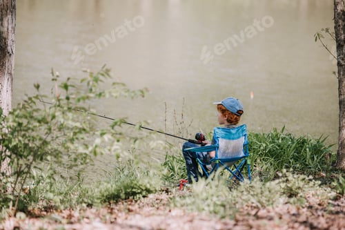 Preview: Boy Fishing by the Lake on a Sunny Day