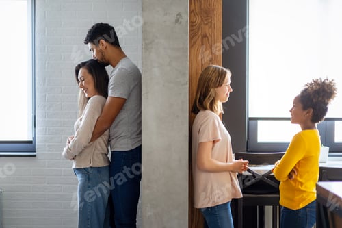 Preview: Portrait of happy multiethnic family having fun together at home.