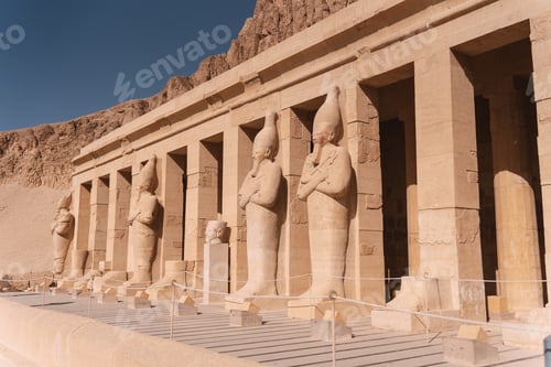 Preview: Majestic osirian statues guarding hatshepsut temple in luxor, egypt