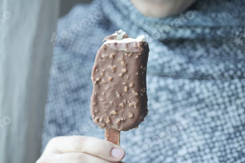 Preview: young women eating chocolate flavor ice cream