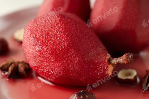 Preview: Tasty and delicious food concept - pear in wine