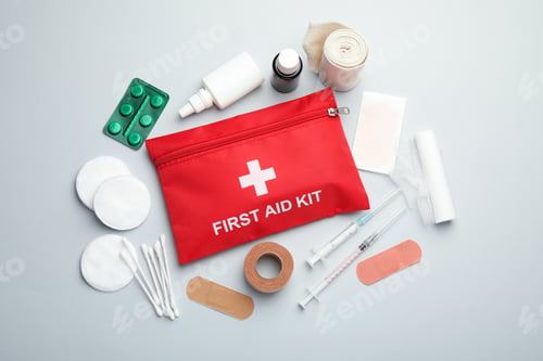 Preview: Flat lay composition with first aid kit on gray background
