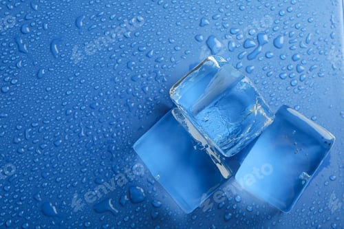 Preview: Ice cubes on wet blue background, space for text