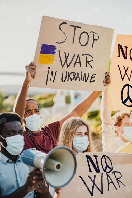 Preview: Young multiracial demonstrators protesting for climate change wearing protective masks outdoor