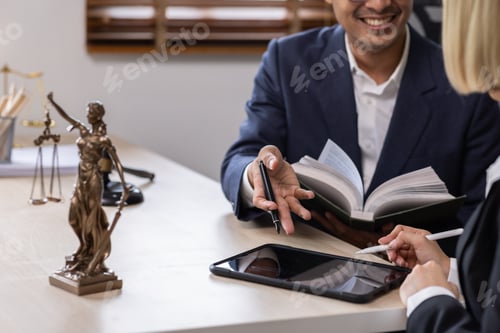 Preview: Business Asian people and lawyers, Businessman and lawyer discuss the contract document. Judge gavel