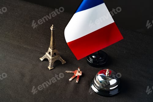 Preview: France flag on the reception desk in the hotel lobby