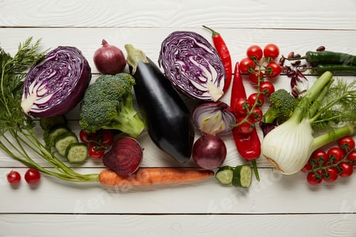 Preview: Top view of fresh vegetables on textured wooden surface