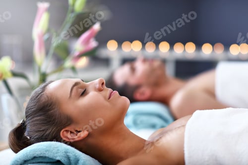 Preview: Adult happy couple relaxing in spa salon