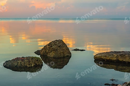 Preview: Sunrise on the bay with perfectly still water and beautiful reflections