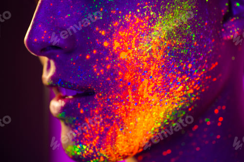 Preview: Fashion model with fluo painting on the face