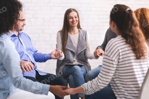 Preview: Group of addicted people holding hands, sitting in circle of trust