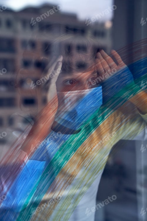 Preview: Child in mask looking through window at home